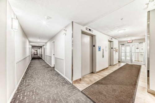 311-290 Shawville Way Se, Calgary, AB - Indoor Photo Showing Other Room