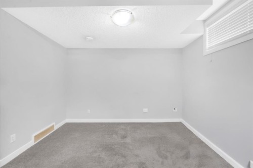 43 Cornerbrook Gate Ne, Calgary, AB - Indoor Photo Showing Other Room