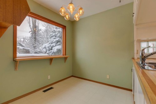 77 Elma Street West, Okotoks, AB - Indoor Photo Showing Other Room