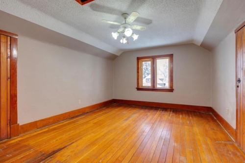 77 Elma Street West, Okotoks, AB - Indoor Photo Showing Other Room