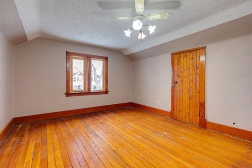 77 Elma Street West, Okotoks, AB - Indoor Photo Showing Other Room