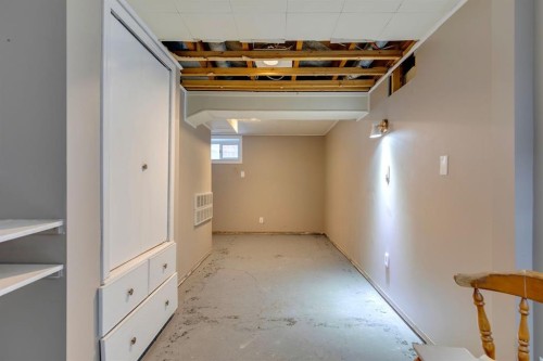 77 Elma Street West, Okotoks, AB - Indoor Photo Showing Other Room