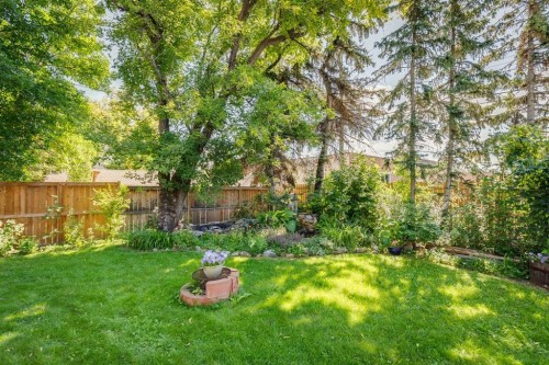 77 Elma Street West, Okotoks, AB - Outdoor With Backyard