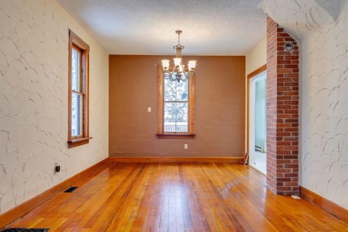 77 Elma Street West, Okotoks, AB - Indoor Photo Showing Other Room