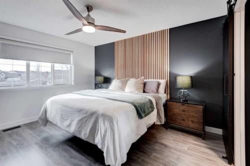 44 New Brighton Landing Se, Calgary, AB - Indoor Photo Showing Bedroom