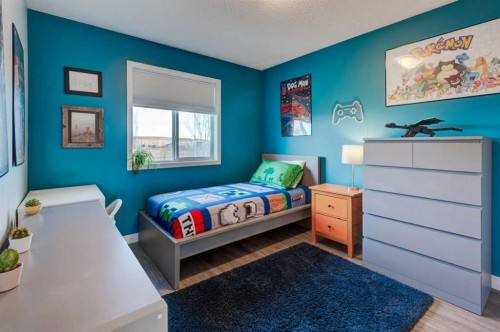 44 New Brighton Landing Se, Calgary, AB - Indoor Photo Showing Bedroom