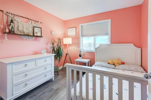 44 New Brighton Landing Se, Calgary, AB - Indoor Photo Showing Bedroom
