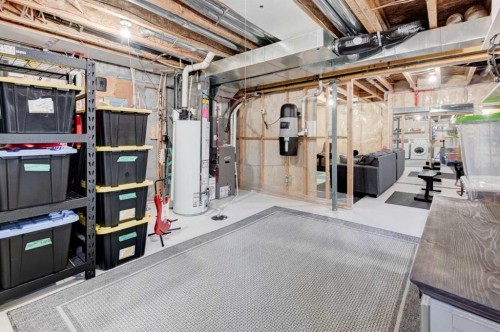 44 New Brighton Landing Se, Calgary, AB - Indoor Photo Showing Basement