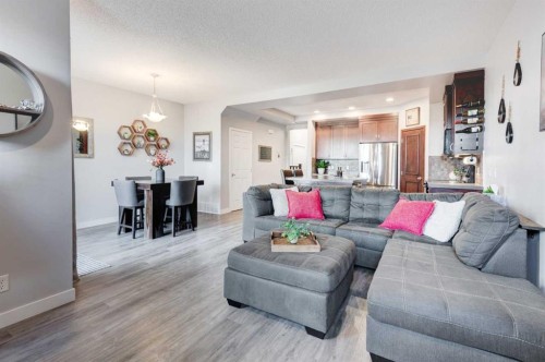 44 New Brighton Landing Se, Calgary, AB - Indoor Photo Showing Living Room