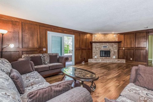 55 Bermuda Close Nw, Calgary, AB - Indoor Photo Showing Living Room With Fireplace