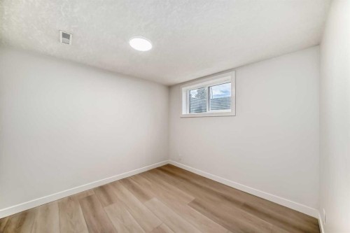 1242 Mardale Drive Ne, Calgary, AB - Indoor Photo Showing Other Room