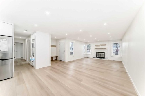 1242 Mardale Drive Ne, Calgary, AB - Indoor With Fireplace