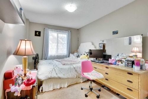 56 Country Village Manor Ne, Calgary, AB - Indoor Photo Showing Bedroom