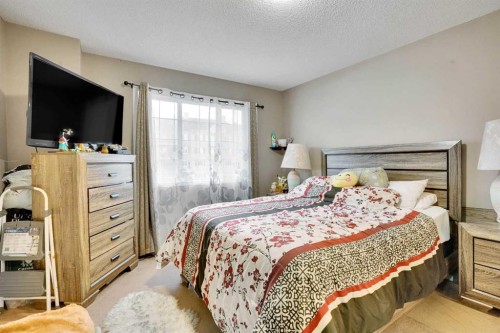 56 Country Village Manor Ne, Calgary, AB - Indoor Photo Showing Bedroom