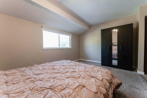 1101-829 Coach Bluff Crescent Sw, Calgary, AB - Indoor Photo Showing Bedroom