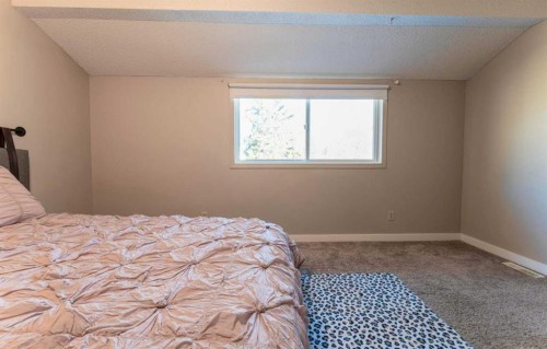 1101-829 Coach Bluff Crescent Sw, Calgary, AB - Indoor Photo Showing Bedroom