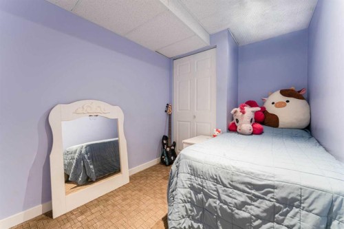 1101-829 Coach Bluff Crescent Sw, Calgary, AB - Indoor Photo Showing Bedroom