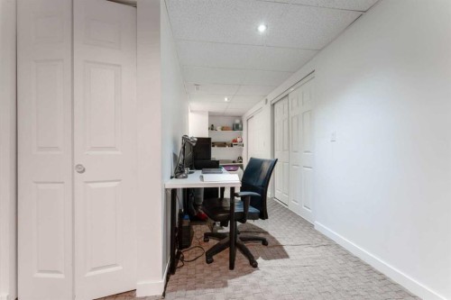 1101-829 Coach Bluff Crescent Sw, Calgary, AB - Indoor Photo Showing Office