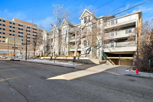 310-2204 1 Street Sw, Calgary, AB - Outdoor With Balcony With Facade