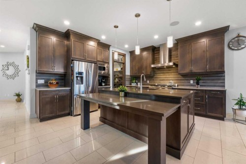 2233 Bayside Circle Sw, Airdrie, AB - Indoor Photo Showing Kitchen With Stainless Steel Kitchen With Double Sink With Upgraded Kitchen