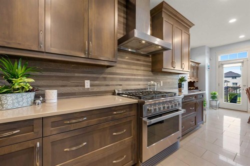 2233 Bayside Circle Sw, Airdrie, AB - Indoor Photo Showing Kitchen With Upgraded Kitchen