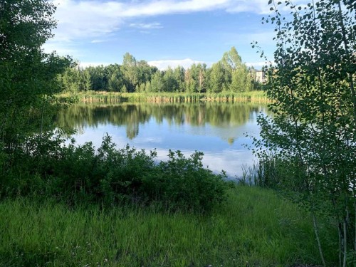 135 Autumn Close Se, Calgary, AB - Outdoor With Body Of Water With View