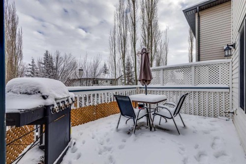 144 Bow Ridge Drive, Cochrane, AB - Outdoor With Deck Patio Veranda