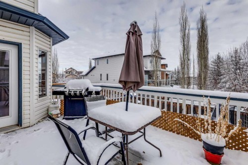 144 Bow Ridge Drive, Cochrane, AB - Outdoor With Deck Patio Veranda