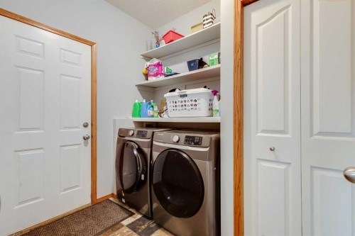 144 Bow Ridge Drive, Cochrane, AB - Indoor Photo Showing Laundry Room