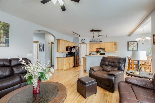 144 Bow Ridge Drive, Cochrane, AB - Indoor Photo Showing Living Room