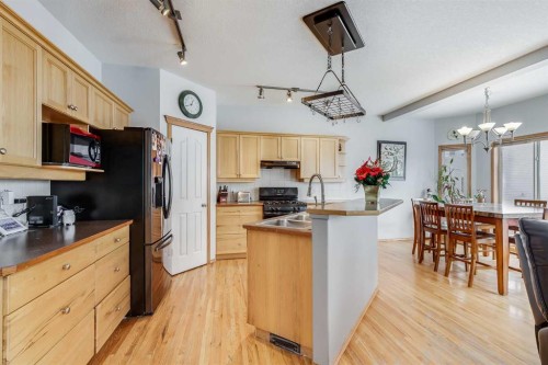 144 Bow Ridge Drive, Cochrane, AB - Indoor Photo Showing Kitchen