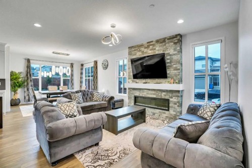 41 Howse Heights Ne, Calgary, AB - Indoor Photo Showing Living Room With Fireplace