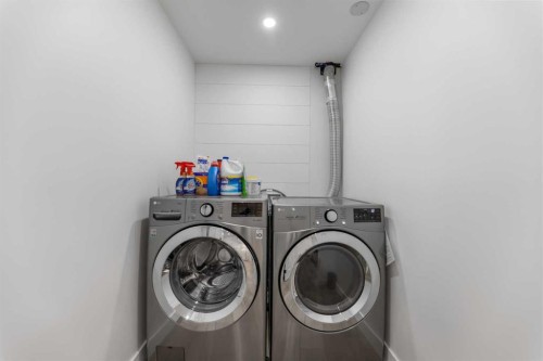 143 Prestwick Heath Se, Calgary, AB - Indoor Photo Showing Laundry Room