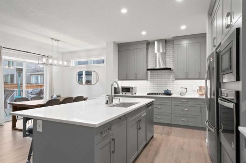 21 Seton Parade Se, Calgary, AB - Indoor Photo Showing Kitchen With Upgraded Kitchen
