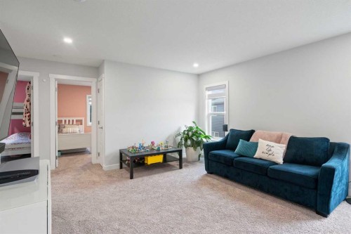 21 Seton Parade Se, Calgary, AB - Indoor Photo Showing Living Room