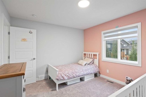 21 Seton Parade Se, Calgary, AB - Indoor Photo Showing Bedroom