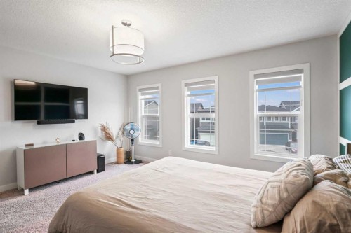 21 Seton Parade Se, Calgary, AB - Indoor Photo Showing Bedroom