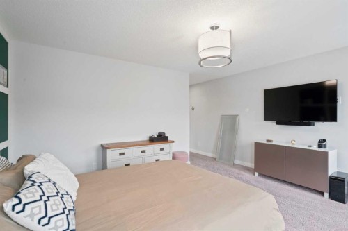 21 Seton Parade Se, Calgary, AB - Indoor Photo Showing Bedroom