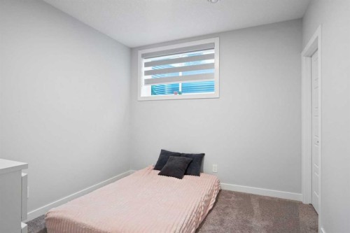 21 Seton Parade Se, Calgary, AB - Indoor Photo Showing Bedroom