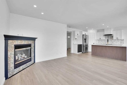 30 New Brighton Circle Se, Calgary, AB - Indoor With Fireplace