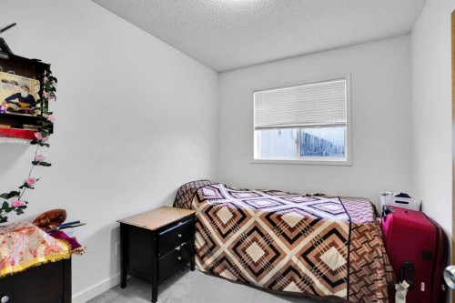 63 Martinbrook Road Ne, Calgary, AB - Indoor Photo Showing Bedroom