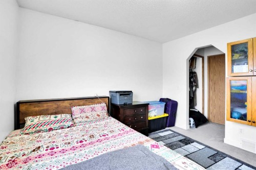 63 Martinbrook Road Ne, Calgary, AB - Indoor Photo Showing Bedroom