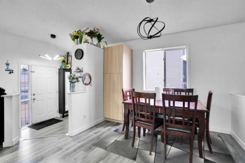 63 Martinbrook Road Ne, Calgary, AB - Indoor Photo Showing Dining Room