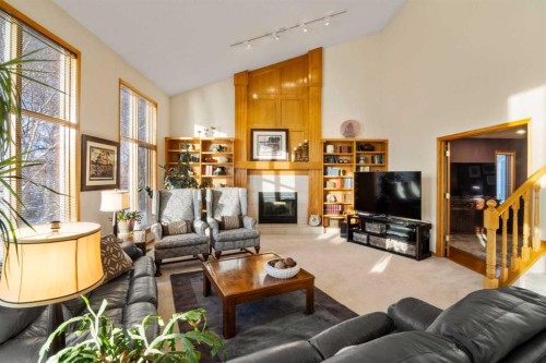 2331 Morris Crescent Se, Airdrie, AB - Indoor Photo Showing Living Room With Fireplace