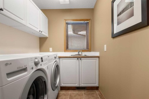 2331 Morris Crescent Se, Airdrie, AB - Indoor Photo Showing Laundry Room