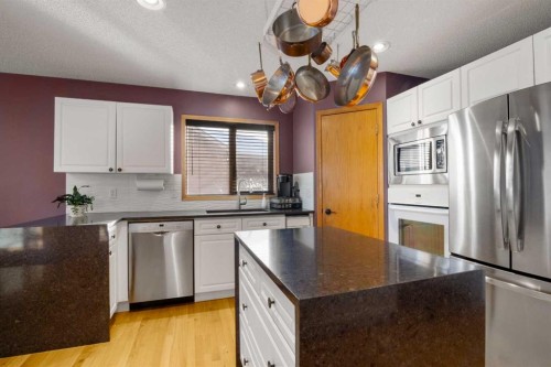 2331 Morris Crescent Se, Airdrie, AB - Indoor Photo Showing Kitchen With Upgraded Kitchen