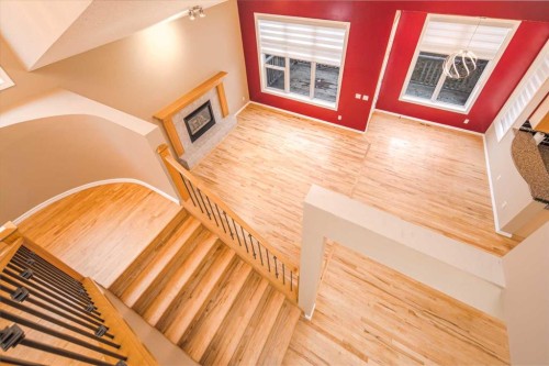 18 Hidden Creek Point Nw, Calgary, AB - Indoor Photo Showing Other Room With Fireplace