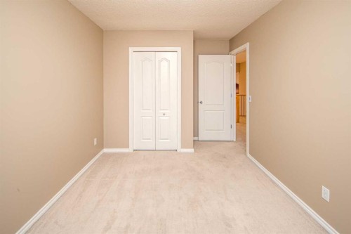 18 Hidden Creek Point Nw, Calgary, AB - Indoor Photo Showing Other Room