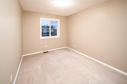 18 Hidden Creek Point Nw, Calgary, AB - Indoor Photo Showing Other Room