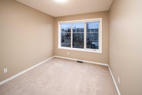 18 Hidden Creek Point Nw, Calgary, AB - Indoor Photo Showing Other Room